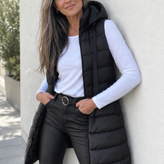 Woman wearing the Dorothy and James Charleston RAIN Puffer Vest
