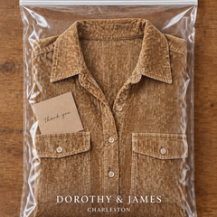 Dorothy and James Charleston packaging for the Beatrice Midi Dress in Corduroy