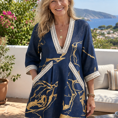 Woman wearing the Dorothy & James Charleston Cosette navy gold mini dress