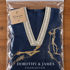 Dorothy & James Charleston packaging for the Cosette navy mini dress