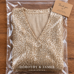 Dorothy & James Charleston packaging for Kate Sequin V-Neck Blouse
