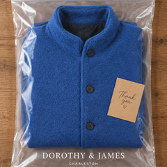 Felicity coat folded in Dorothy & James Charleston packaging
