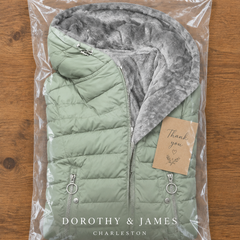 Sienna winter coat folded in Dorothy & James Charleston packaging