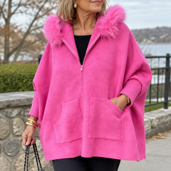 Woman wearing the Annabelle elegant fur-collar hooded jacket outdoors