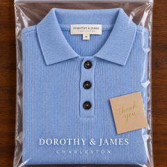 Florence polo sweater folded in Dorothy & James Charleston packaging