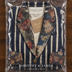 Boheme striped blazer folded in Dorothy & James Charleston packaging with thank you card