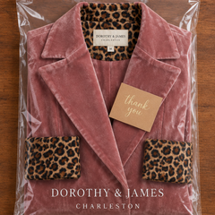 Madison velvet coat folded in Dorothy & James Charleston packaging with thank-you card