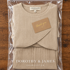 Patricia two-piece set folded in Dorothy & James Charleston packaging with thank-you card