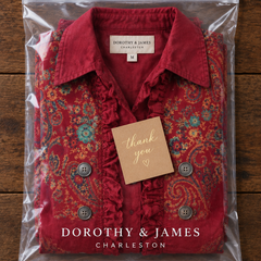 Fayrene Bohemian Paisley Ruffle Jacket folded in Dorothy & James Charleston packaging with thank you card