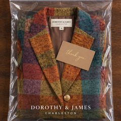The Ornella Plaid Blazer folded in Dorothy & James Charleston packaging with thank you card