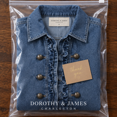 Ruffelle Ruffled Jacket folded in Dorothy & James Charleston packaging with thank you card