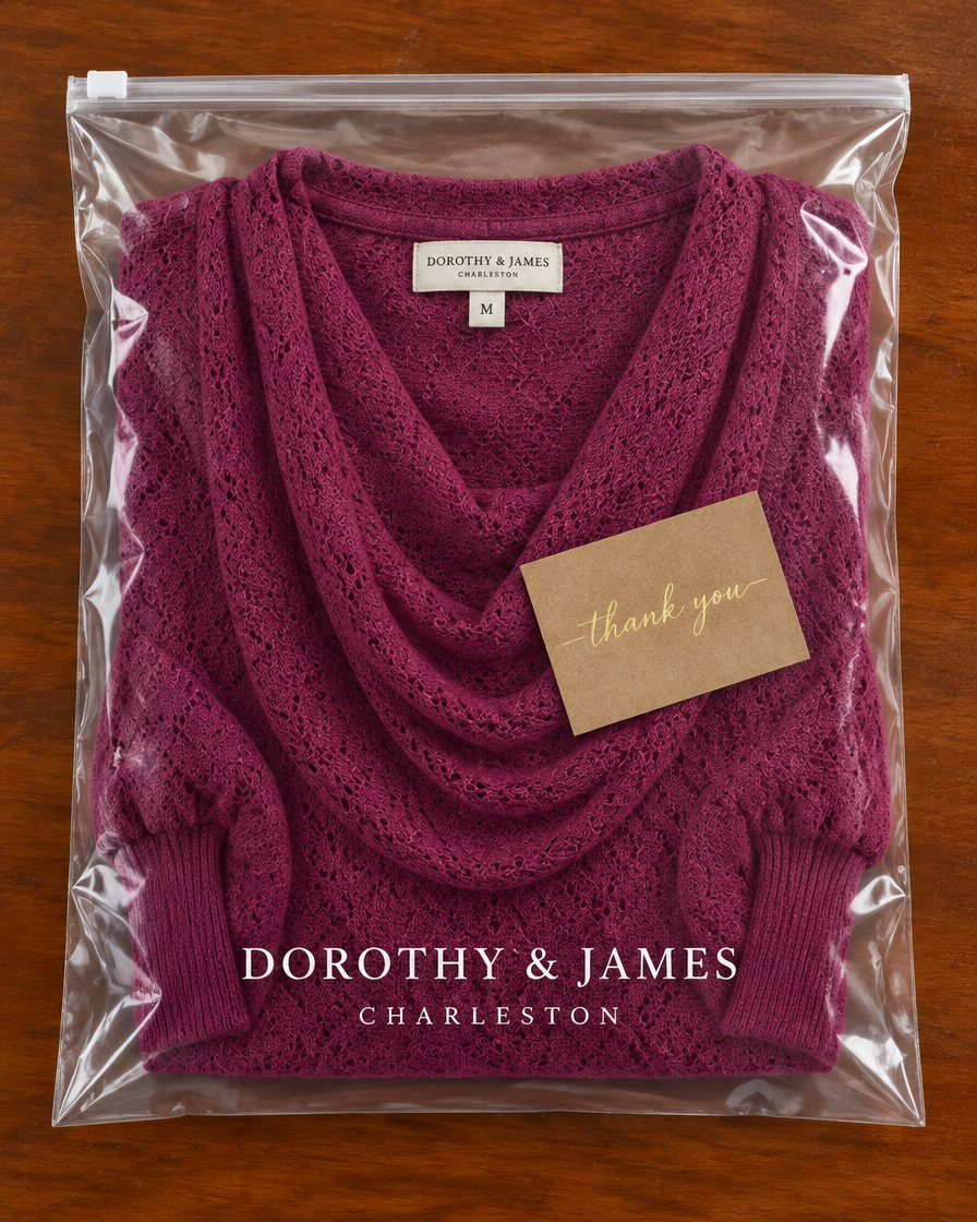 Wine red cowl-neck top folded in Dorothy & James Charleston packaging with thank you card
