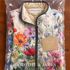 Kaia floral quilted jacket folded in Dorothy & James Charleston packaging
